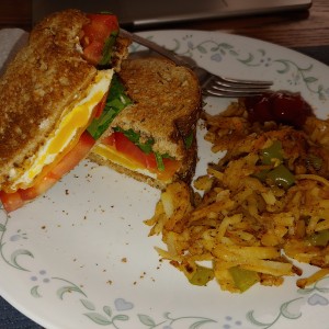 Egg Sandwich And Hash Browns